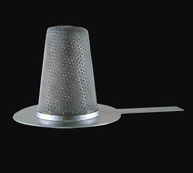A perforated flat bottom cone filter with stainless steel handle.