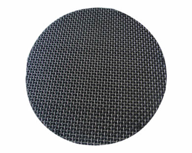 A round black wire cloth sintered filter disc.
