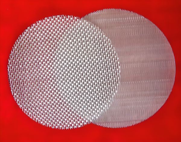 Two round filter discs with no wrapping edge.